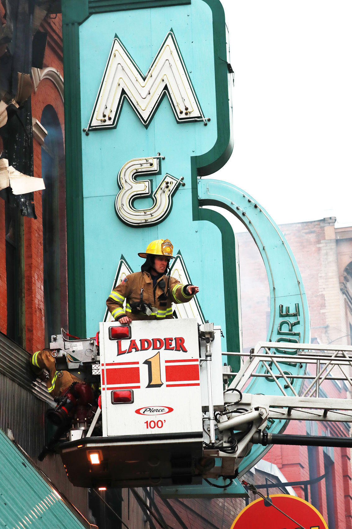 Butte firefighters save iconic M&M sign as fire destorys the historic building